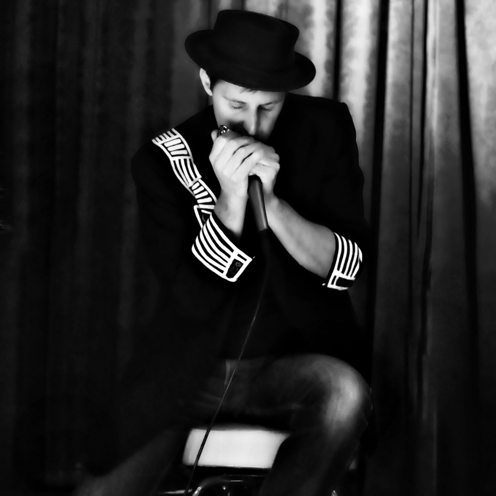 Kevin Carrel Footer, harmonica player by Laura Mingo